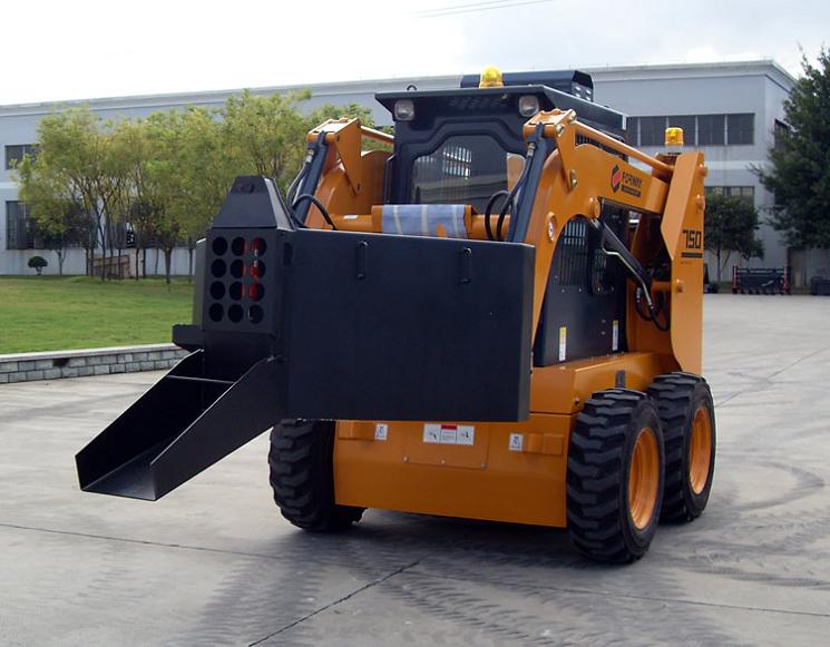 Skid steer loader with Concrete Spreader