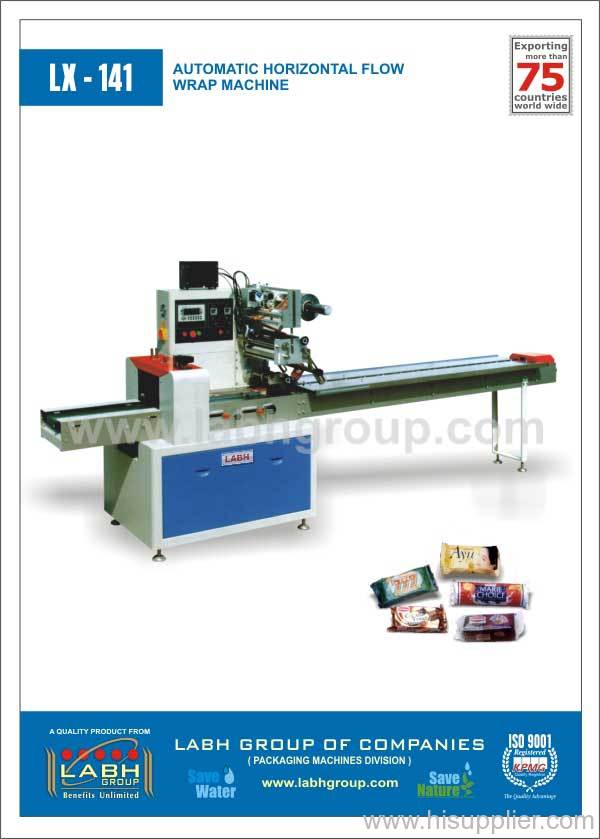 Flow wrapping machine