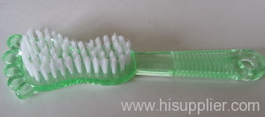 Plastic brush with pumice stone