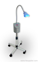 Tooth bleaching machine