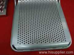 chairs made of perforated metal meshes