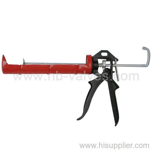 Swivel barrel caulking gun