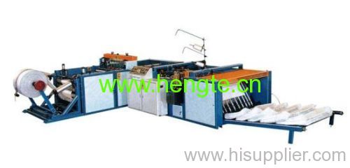 AUTOMATIC CUTTING AND SEWING MACHINE