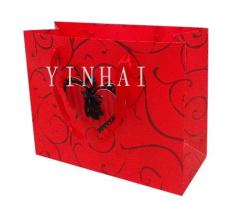 red paper gift bags