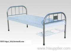 Flat hospital bed with stainless steel bed head