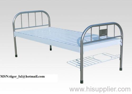 Flat hospital bed with stainless steel bed head