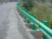 Corrugated sheet steel beams for guardrail