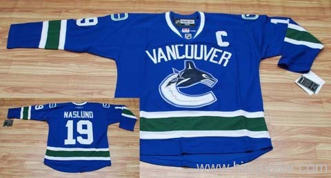 #19 BLUE Markus Naslund VANCOUVER CANUCKS