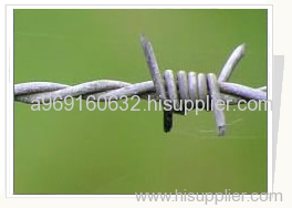 galvanized barbed wire fence