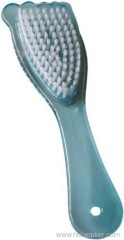 Plastic brush with pumice stone