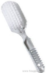 Plastic brush with pumice stone