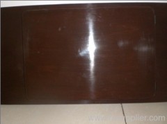 Dark brown three drawer table