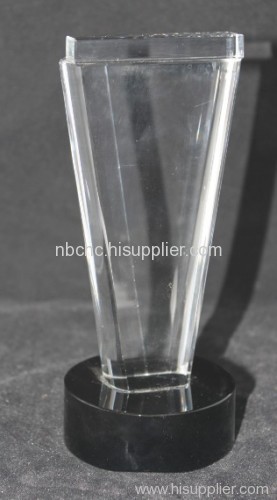 white glass trophy with black base