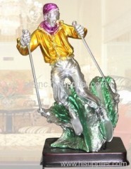 skiing resin people figurines