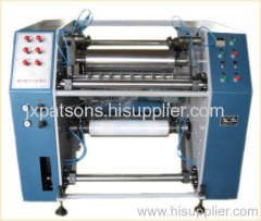 Pre stretching film slitter rewinder machine