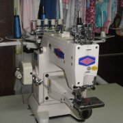 Needle double stitching machine