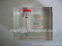 Acrylic paperweight with pill embed