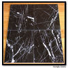 white vein in black marble