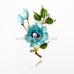 blue flower shaped brooches