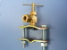 Piercing saddle valve