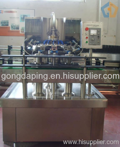 Bactericidal spray machine for beverage bottles