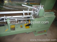 Double loop bale ties machine