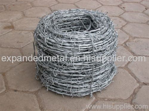 Galvanised barbed wire mesh