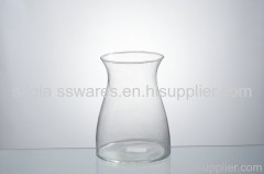 clear glass vase by human blown