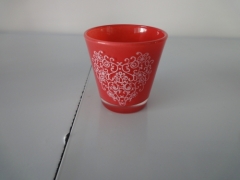 red glass candle holder