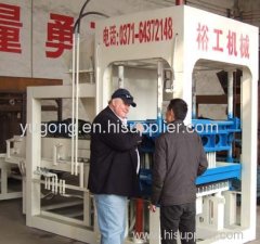 Cement brick making machine