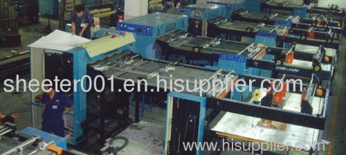 Paper and board sheeting machine
