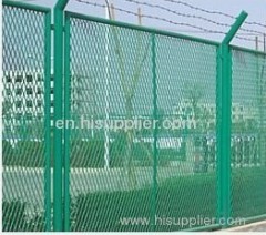 Expanded metal mesh fence