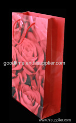 red flower gift bag