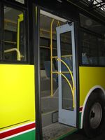 Pneumatic swing in bus door
