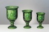 green hurricane candle holder