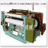 Shuttless weaving machine