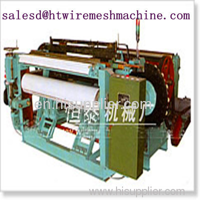 Shuttless weaving machine