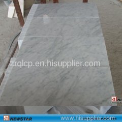 Pure white marble tiles and slabs