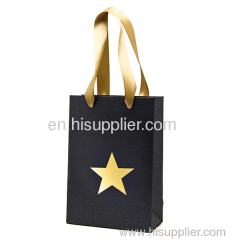 Gold star paper gift bags