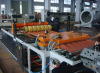 Wave board extruding machine