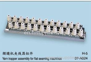 yarn trapper assembly for flatseaming machine