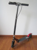 Scooter with stand and handlebrake