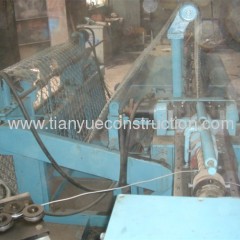 Automatic chain link fence machine