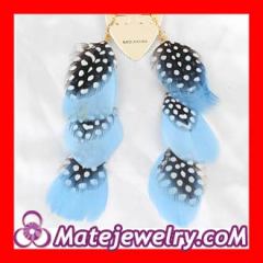 Polka dot feather earrings