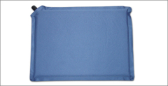 Self-inflating seat cushion