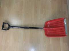 red snow shovel