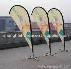 curved pole with flying banners