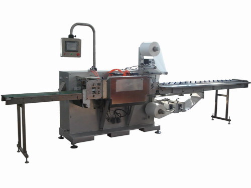 Surgical latex glove packaging machine