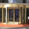 Automatic glass revolving door