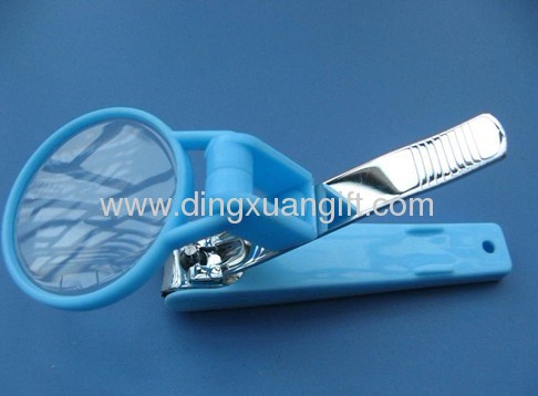 Nail clipper with magnifying glass